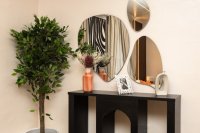 Gerookt glas en spiegels geven je kamer meer diepte